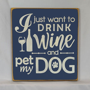 “I Just Want to Drink Wine and Pet My Dog” Funny handcrafted wood sign with an adorable paw print stamp and an image of a wine glass and bottle, 12x12 inches white font over Navy Blue. Rustic modern farmhouse home décor