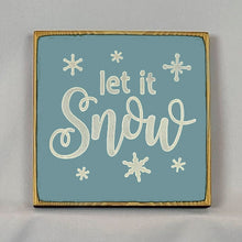 Load image into Gallery viewer, “Let it Snow” handcrafted wood sign with snowflakes, 5.5x5.5 inches White font over Blue. Rustic modern farmhouse home décor
