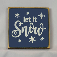 Load image into Gallery viewer, “Let it Snow” handcrafted wood sign with snowflakes, 5.5x5.5 inches White font over Navy Blue. Rustic modern farmhouse home décor
