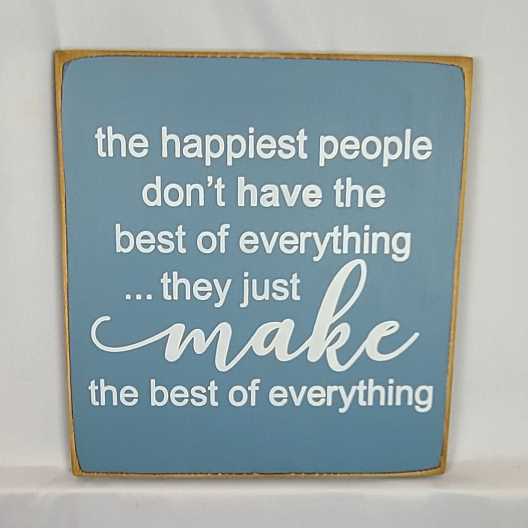 The Happiest People Don't Have the Best of Everything wooden sign